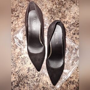 Black suede heels. Size 9 1/2 or 43. Never worn. Excellent condition